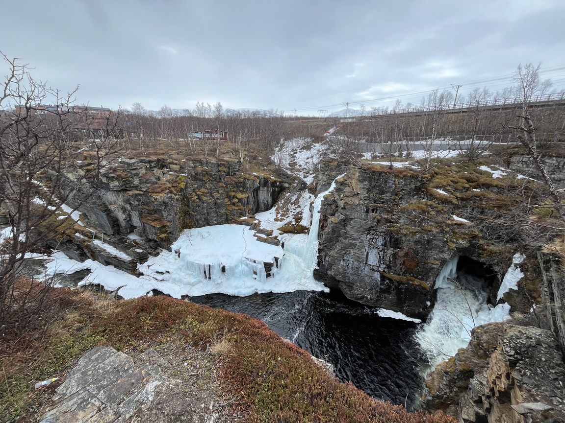 Abisko waterfall and surrounding rock formation, still a bit frozen